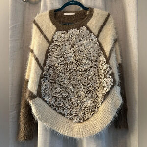 Egoist Sweater Multi-material with Pedal like design, stripes and mohair look.